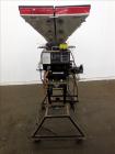 Used McGuire 4 Color Weigh Scale Blender, Model W-140RM1. Mounted on a stand with casters. Serial# 89574.