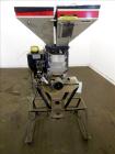 Used McGuire 4 Color Weigh Scale Blender, Model W-140RM1. Mounted on a stand with casters. Serial# 89574.