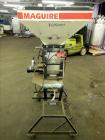 Used McGuire 4 Color Weigh Scale Blender, Model W-140RM1. Mounted on a stand with casters. Serial# 89574.