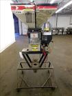 Used McGuire 4 Color Weigh Scale Blender, Model W-140RM1. Mounted on a stand with casters. Serial# 89574.