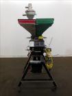 Used McGuire 4 Color Weigh Scale Blender, Model W-140RM1. Mounted on a stand with casters. Serial# 89363.