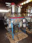 Used Maguire 4 material volumetric blender, model WSB 440T, rated up to 1450 lbs/hr, with Mould Tek pneumatic vacuum loaders, 1/6 HP 110 volt mixer motor, serial# 102135.14.