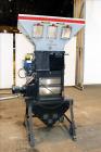 Used Maguire Weigh Scale Blender, Model WSB 940 Gravimetric Blender. Maximum throughput 2,645 lbs per hour to 3,200 lbs per hour. Includes hopper with 4 material compartments, Air operated slide gate...