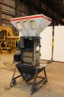 Used Maguire Weigh Scale Blender, Model WSB 940 Gravimetric Blender. Maximum throughput 2,645 lbs per hour to 3,200 lbs per hour. Includes hopper with 4 material compartments, Air operated slide gate...