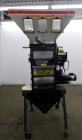 Used Maguire Weigh Scale Blender, Model WSB 940 Gravimetric Blender. Maximum throughput 2,645 lbs per hour to 3,200 lbs per hour. Includes hopper with 4 material compartments, Air operated slide gate...