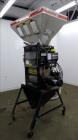 Used Maguire Weigh Scale Blender, Model WSB 940 Gravimetric Blender. Maximum throughput 2,645 lbs per hour to 3,200 lbs per hour. Includes hopper with 4 material compartments, Air operated slide gate...