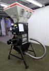 Used Maguire Weigh Scale Blender, Model WSB 940 Gravimetric Blender. Maximum throughput 2,645 lbs per hour to 3,200 lbs per hour. Includes hopper with 4 material compartments, Air operated slide gate...