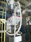 Used Maguire Model WSB240F 4 Component Blender. Up to 900 lbs/hour, 4 slide gates, hopper material level sensors, hopper site glasses, Gaylord gravity discharge into approximate 30 cubic foot materia...