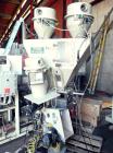 Used Maguire/Conair Franklin 4 Component Gravimetric Blending System. Includes Maguire weight scale, (4) Selectronic 5 24 vac, vacuum loader controls, vacuum receivers, and operator panel. Previously...