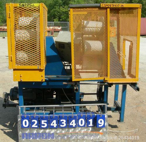 Used Hose Reinforcement Station.  (2) 6 can stations.  Both driven by a 2 hp, 180 volt, 2500 rpm DC motor.  Includes a control panel.  Mounted on a frame.