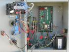 Used Hose Reinforcement Station.  (2) 6 can stations.  Both driven by a 2 hp, 180 volt, 2500 rpm DC motor.  Includes a control panel.  Mounted on a frame.