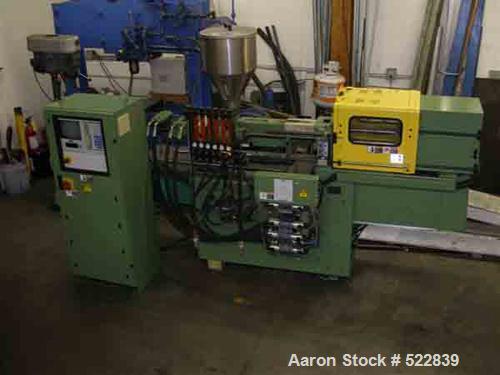 USED: Arburg model 221M-55-250, 28 ton, 1 oz shot capacity. Mfg 1997. Toggle clamp having 7.87" stroke, tie bar spacing 8.7" x 8.7", 13.46" x 9.84" daylight max/min. 7.28 hp. Unit equipped with Multi...