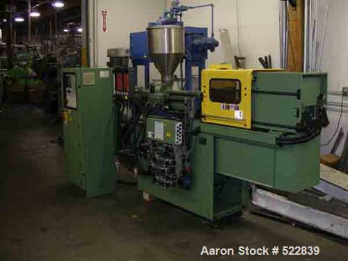 USED: Arburg model 221M-55-250, 28 ton, 1 oz shot capacity. Mfg 1997. Toggle clamp having 7.87" stroke, tie bar spacing 8.7" x 8.7", 13.46" x 9.84" daylight max/min. 7.28 hp. Unit equipped with Multi...