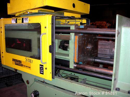 USED: Arburg Allrounder injection mold machine, model 320-210-750,  83 ton clamping pressure. Platen size 19.3" x 19.3". Distance between tie bars 12.6". Max daylight 24.6". Max stroke of hydraulic e...