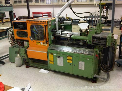 Used Battenfeld Injection Molding Machine, Model 100/40HK.  100 grams PS barrel capacity, 40 metric ton toggle clamp. Includes mold heater and spare parts. Manufactured 1979.