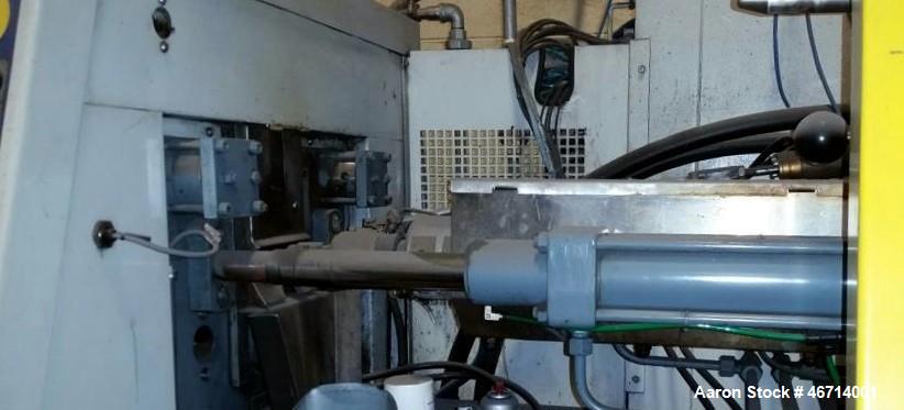 Used Battenfeld Injection Molding Machine, Model BA400/125. With Unilog 4000 controls. Approximately 44 ton and 10 ounce Shot. Size of mould platens (h x v): 440 mm x 440 mm. Distance between tie bar...