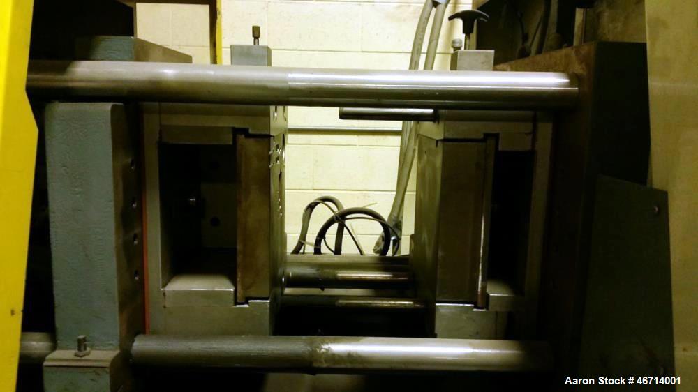 Used Battenfeld Injection Molding Machine, Model BA400/125. With Unilog 4000 controls. Approximately 44 ton and 10 ounce Shot. Size of mould platens (h x v): 440 mm x 440 mm. Distance between tie bar...