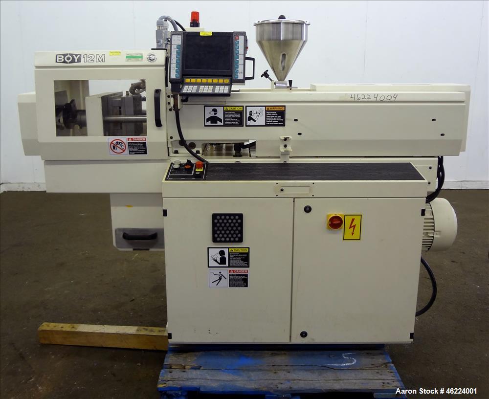Used Boy Injection Molder, Model 12M. Approximate 13 tons. 160 BAR. Distance Between Tie Bars 259mm. Tie Bar Diameter 35mm. Maximum Plate Distance 300mm. Minimum Plate Distance 100mm. Screw Diameter ...