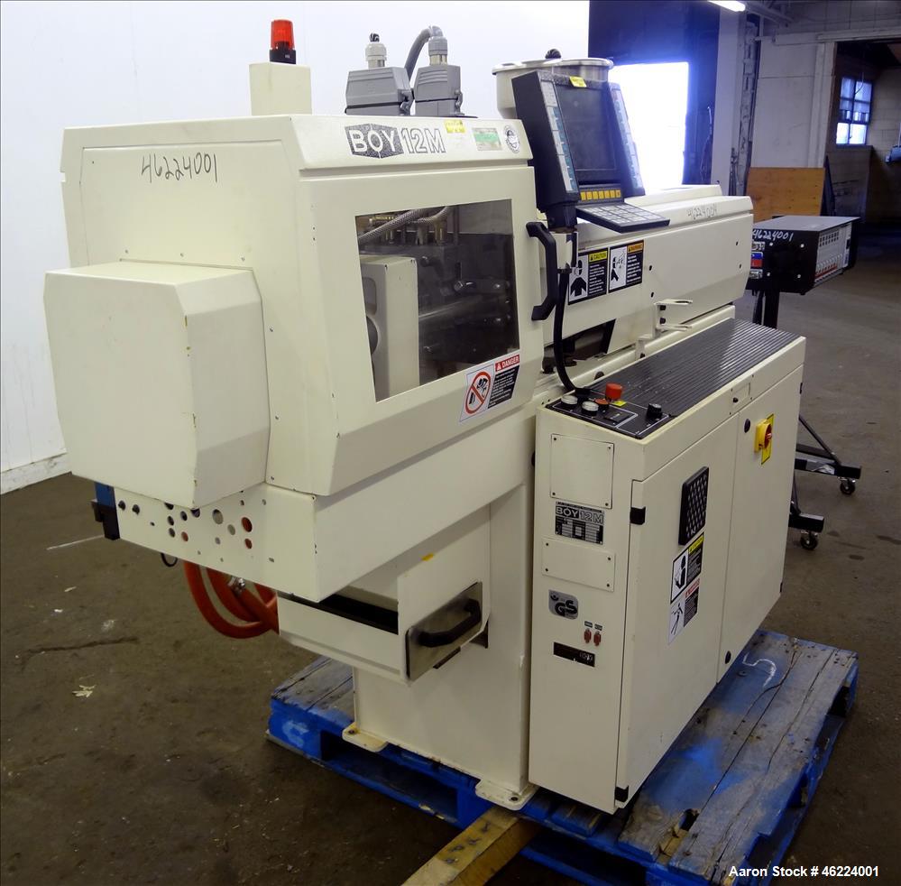 Used Boy Injection Molder, Model 12M. Approximate 13 tons. 160 BAR. Distance Between Tie Bars 259mm. Tie Bar Diameter 35mm. Maximum Plate Distance 300mm. Minimum Plate Distance 100mm. Screw Diameter ...