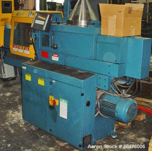 Used Boy horizontal injection molder, 25 ton, model 25M. With Proscan control LCD screen. Includes hopper. Built 1995.