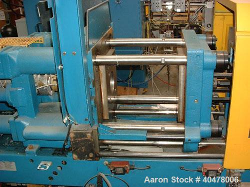 Used Boy horizontal injection molder, 25 ton, model 25M. With Proscan control LCD screen. Includes hopper. Built 1995.