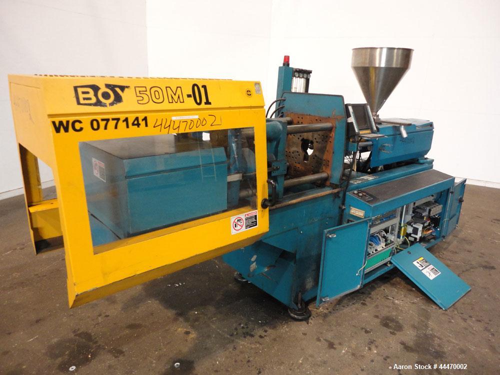 Used Boy Machines 50M Horizontal Injection Molder, 50 Tons, Model 50M. Maximum injection volume 29 oz., maximum opening stoke 13.7”, plate distance 0.8” to 23.6”, clear width between 2.16” diameter t...