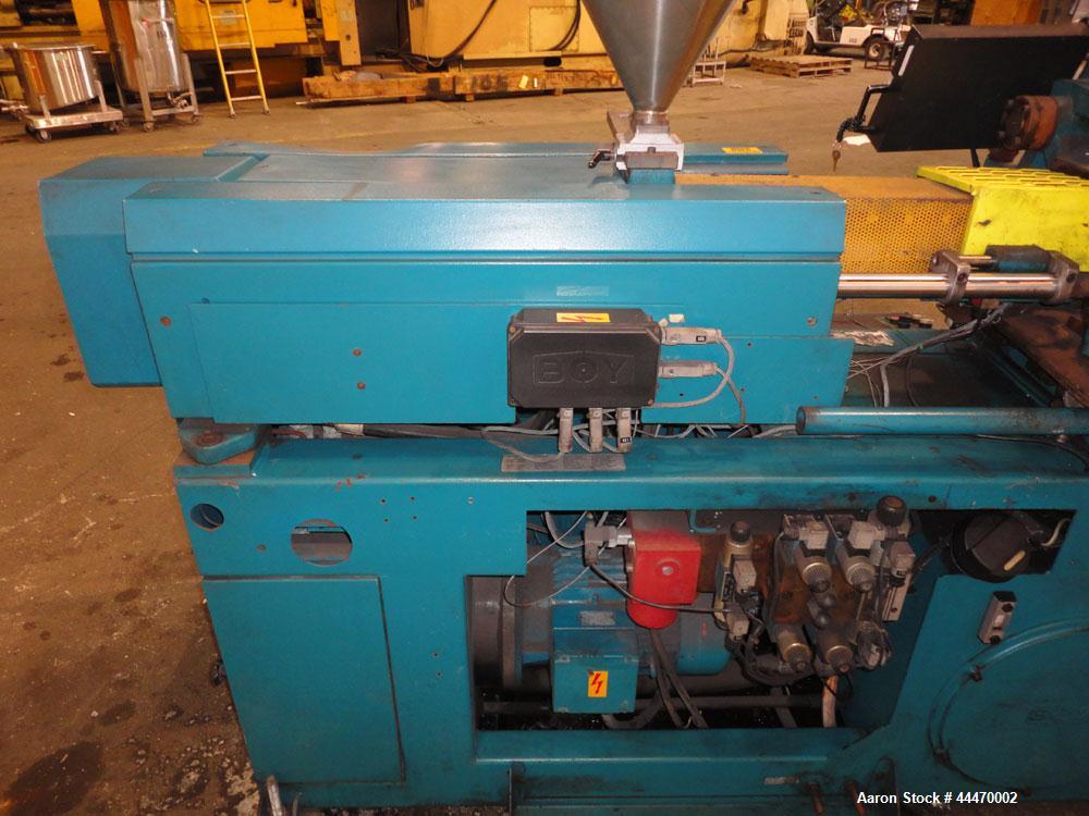 Used Boy Machines 50M Horizontal Injection Molder, 50 Tons, Model 50M. Maximum injection volume 29 oz., maximum opening stoke 13.7”, plate distance 0.8” to 23.6”, clear width between 2.16” diameter t...