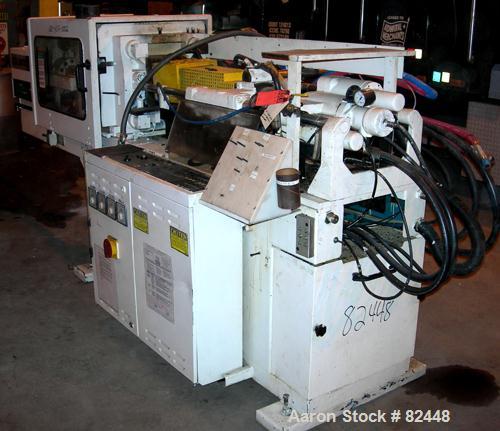 Used Boy Hydraulic Injection Mold Machine, Model 50T2. 50 Ton clamping pressure. Approximate shot sizes, 5.57 ounce with a 42mm screw, 4.58 with a 38mm screw, 3.25 with a 32mm screw, 2.5 with a 28mm ...