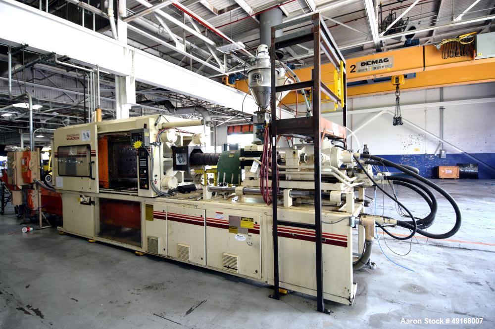 Used Cincinnati Milacron Vista Horizontal Injection Molder, 300 Ton, Model 300-21. Clamp force approximate 300 tons, approximate maximum daylight 48", approximate platen size 36.8” x 36.2”, approxima...