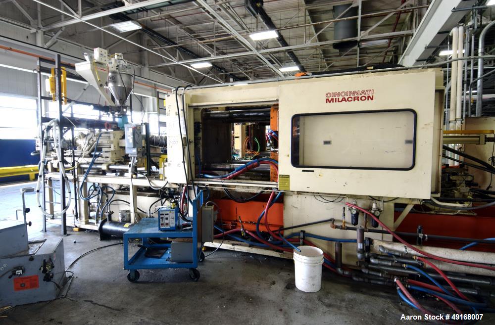 Used Cincinnati Milacron Vista Horizontal Injection Molder, 300 Ton, Model 300-21. Clamp force approximate 300 tons, approximate maximum daylight 48", approximate platen size 36.8” x 36.2”, approxima...