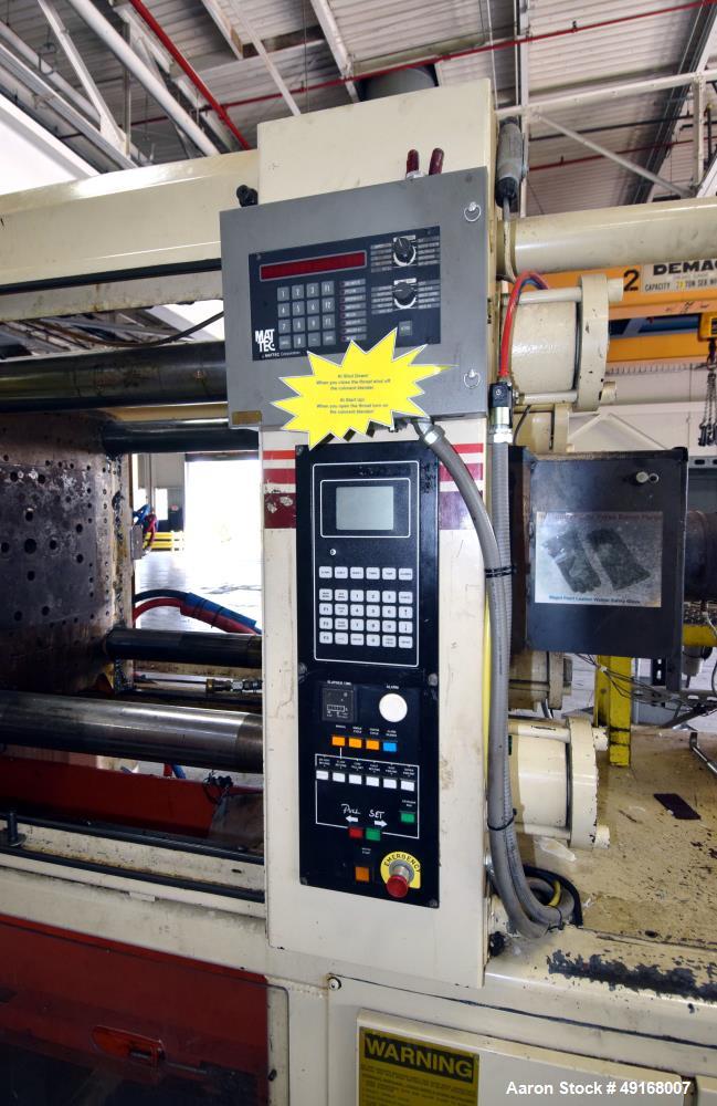 Used Cincinnati Milacron Vista Horizontal Injection Molder, 300 Ton, Model 300-21. Clamp force approximate 300 tons, approximate maximum daylight 48", approximate platen size 36.8” x 36.2”, approxima...