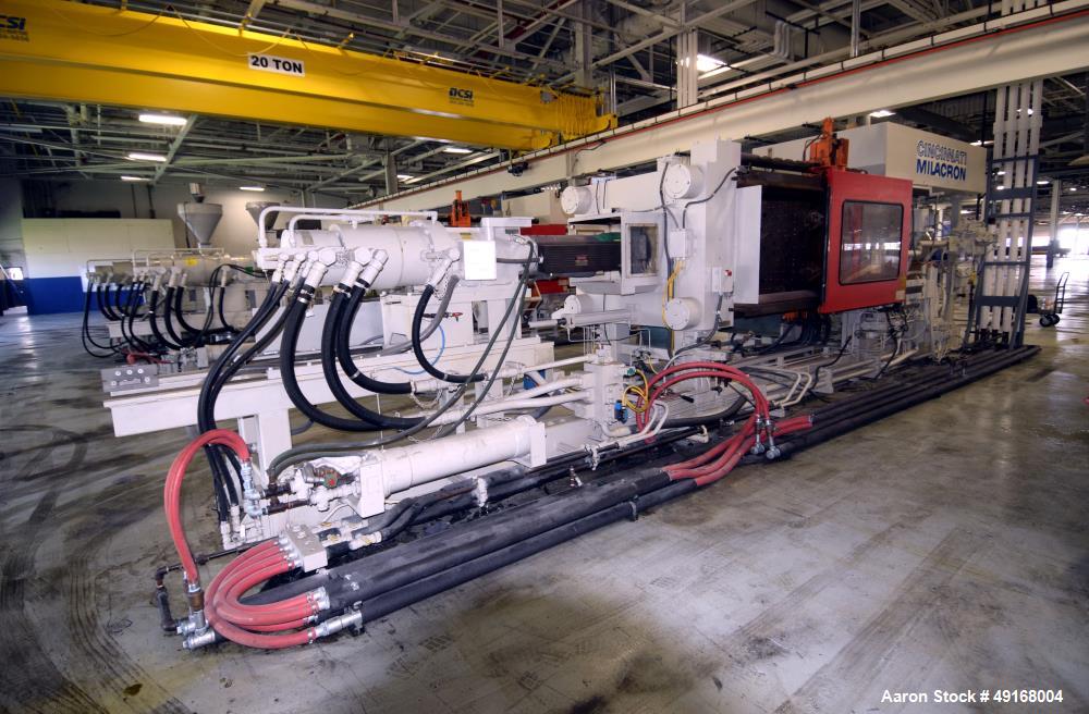 Used Cincinnati Milacron Horizontal Injection Molder, 700 Ton, Model 700-32 W/P. Clamp force approximate 700 tons, approximate maximum daylight 70", approximate platen size 54.5" x 54.5", approximate...