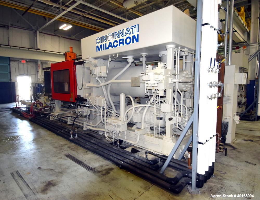 Used Cincinnati Milacron Horizontal Injection Molder, 700 Ton, Model 700-32 W/P. Clamp force approximate 700 tons, approximate maximum daylight 70", approximate platen size 54.5" x 54.5", approximate...