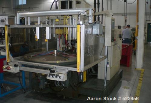 USED: Cincinnati Milacron 70 ton, model CH-70-R, injection molding machine, 4.4 oz. Manufactured 1995. Platen size 10" x 16". Stroke 12". Table configuration rotary, Camac VSX control, light curtains.