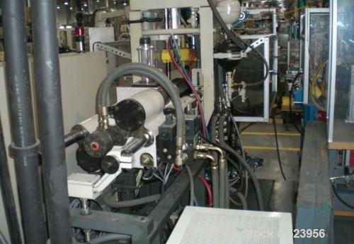 USED: Cincinnati Milacron 70 ton, model CH-70-R, injection molding machine, 4.4 oz. Manufactured 1995. Platen size 10" x 16". Stroke 12". Table configuration rotary, Camac VSX control, light curtains.