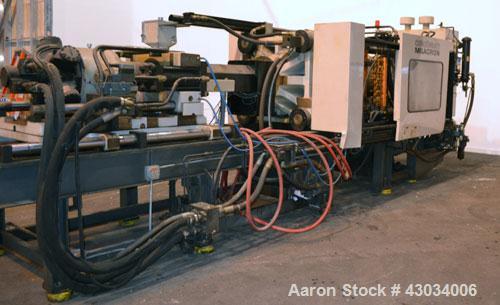Used Cincinnati Milacron 400Ton Hydraulic Horizontal Injection Mold Machine, Model MH-400-41. Approximate 41 ounce shot size. 2.750" Diameter screw size, 20 to 1 U.D. ratio. Approximate 5" diameter t...