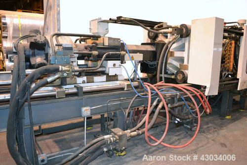 Used Cincinnati Milacron 400Ton Hydraulic Horizontal Injection Mold Machine, Model MH-400-41. Approximate 41 ounce shot size. 2.750" Diameter screw size, 20 to 1 U.D. ratio. Approximate 5" diameter t...
