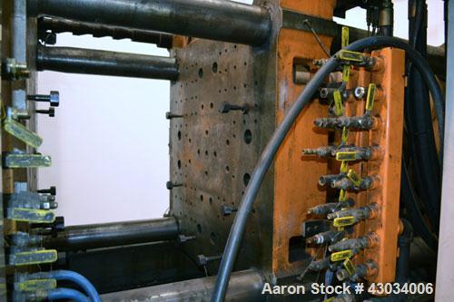 Used Cincinnati Milacron 400Ton Hydraulic Horizontal Injection Mold Machine, Model MH-400-41. Approximate 41 ounce shot size. 2.750" Diameter screw size, 20 to 1 U.D. ratio. Approximate 5" diameter t...