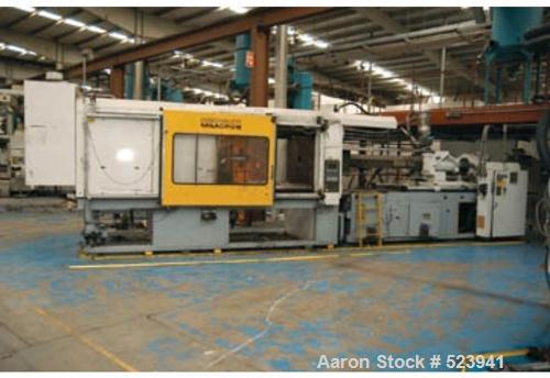 USED: Cincinnati Milacron 850 ton, model VH-850, injection molding machine, 140 oz. Manufactured 1994. Tie bar spacing 45.3" x 37.4". Platen size 66.1" x 58.1". Daylight 75.6". Ejector stroke 7.9". E...