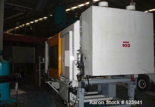 USED: Cincinnati Milacron 850 ton, model VH-850, injection molding machine, 140 oz. Manufactured 1994. Tie bar spacing 45.3" x 37.4". Platen size 66.1" x 58.1". Daylight 75.6". Ejector stroke 7.9". E...