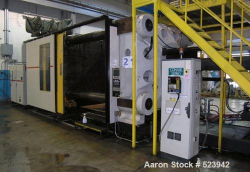 USED: Cincinnati Milacron 2,450 ton, model VL2450-352, injectionmolding machine, 362 oz. Manufactured 1998. Tie bar spacing 72.44" x62.99". Daylight 141.73". 175 hp. Equipped with Camac 486 control,C...