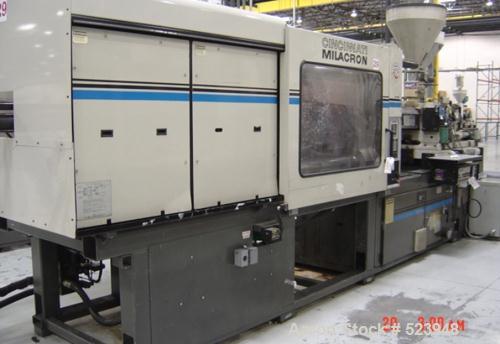 USED: Cincinnati Milacron 440 ton, model VT-440-54, injectionmolding machine, 54 oz. Manufactured 1995. Tie bar spacing 28.9" x28.9". Platen size 39.4" x 39.4". Clamp type toggle, clamp stroke25.6". ...