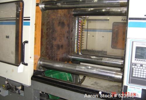 USED: Cincinnati Milacron 440 ton, model VT-440-54, injectionmolding machine, 54 oz. Manufactured 1995. Tie bar spacing 28.9" x28.9". Platen size 39.4" x 39.4". Clamp type toggle, clamp stroke25.6". ...