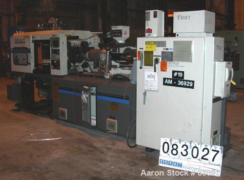 Used Cincinnati 110 Ton Toggle Injection Molding Machine, Model VT110-10. Platen size 24.8" x 22.8". Distance between 2.8" diameter tie bars 14.2" left to right x 16.1" top to bottom. Max daylight 27...