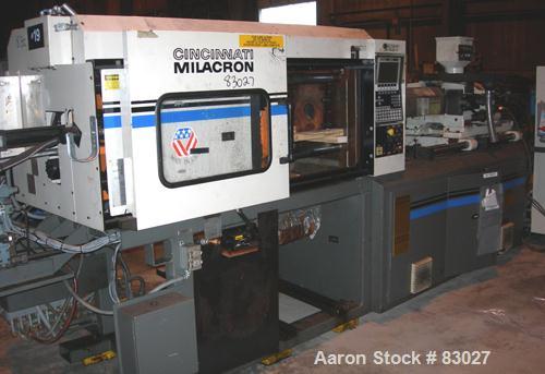 Used Cincinnati 110 Ton Toggle Injection Molding Machine, Model VT110-10. Platen size 24.8" x 22.8". Distance between 2.8" diameter tie bars 14.2" left to right x 16.1" top to bottom. Max daylight 27...