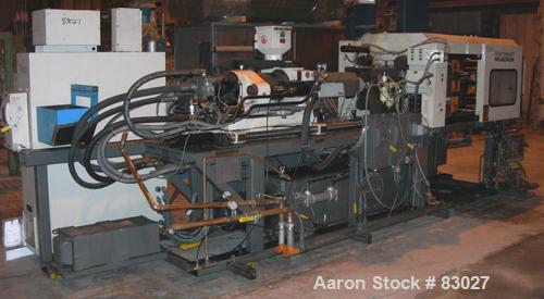 Used Cincinnati 110 Ton Toggle Injection Molding Machine, Model VT110-10. Platen size 24.8" x 22.8". Distance between 2.8" diameter tie bars 14.2" left to right x 16.1" top to bottom. Max daylight 27...