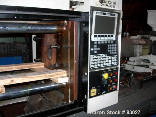 Used Cincinnati 110 Ton Toggle Injection Molding Machine, Model VT110-10. Platen size 24.8" x 22.8". Distance between 2.8" diameter tie bars 14.2" left to right x 16.1" top to bottom. Max daylight 27...