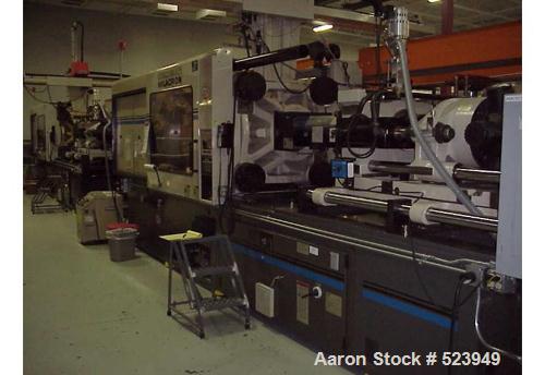 USED: Cincinnati Milacron 440 ton, model VT440-41, injection molding machine, 41 oz. Manufactured 1998. Tie bar spacing 28.9" x 28.9". Platen 39.4" x 39.4". Clamp toggle, clamp stroke 25.6". Daylight...