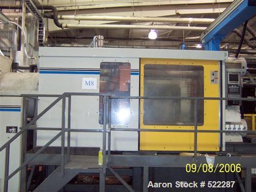 USED: Cincinnati 1000 ton injection mold machine, model VL1000 Square. Shot size 181 oz. Platen size 62.99" x 62.99". Tie bar spacing 44.09" x 44.09". Daylight 92.5". Clamp stroke 48". Equipped with ...