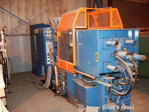 USED: Demag 60 ton injection molding machine, model D60-151. Distance between tie bars 12-1/2", platen size 19-1/2" x 21-1/2", fully open 19", 3/60/460 volt, NCII control panel with video display.